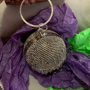 A diamond ball Bag her in over the shoulder diamon